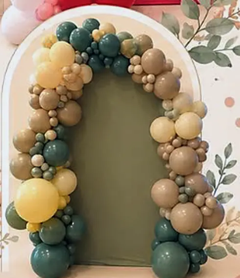 Sage, sand and butter garland on an olive arch